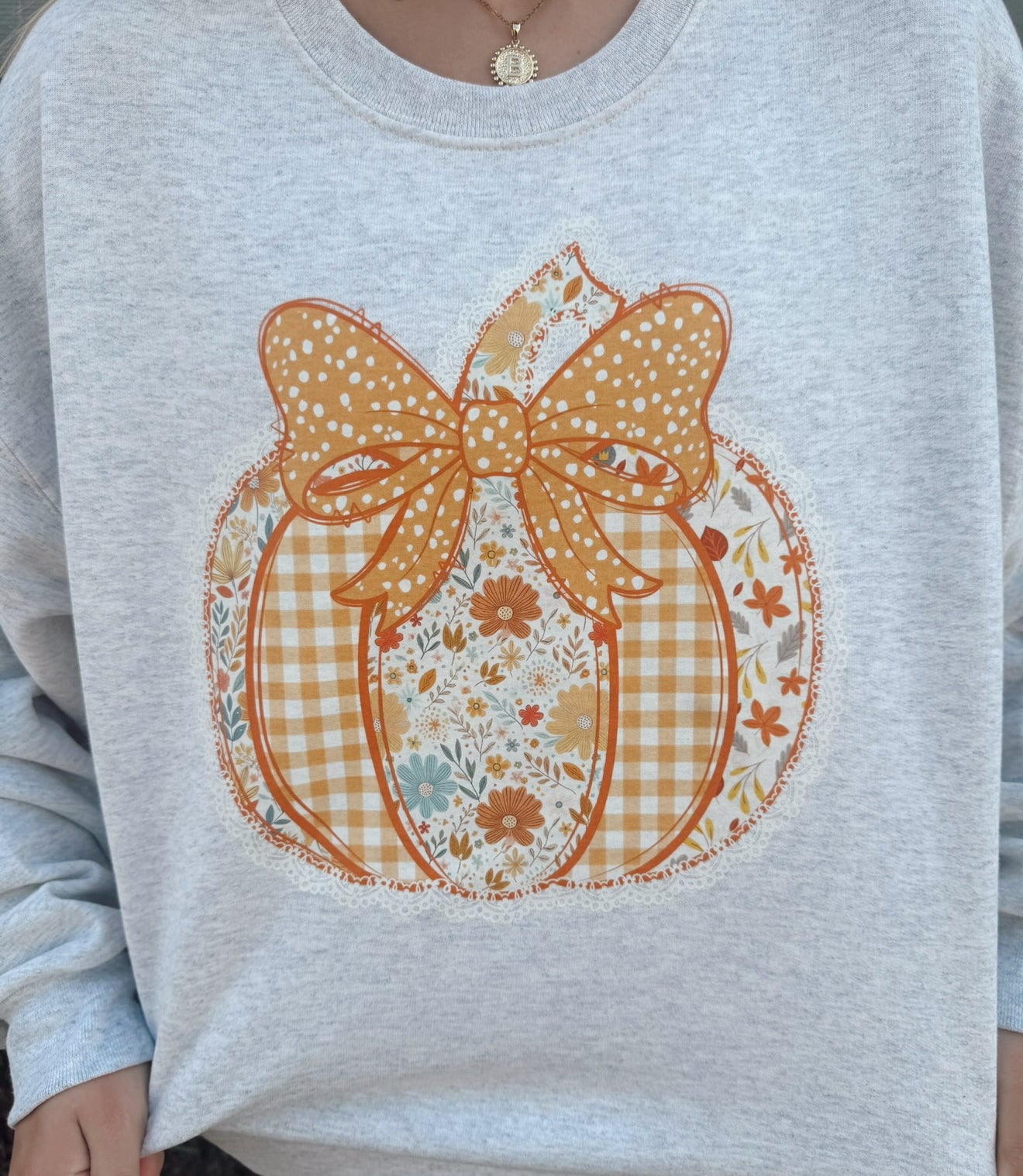 Patchwork Pumpkin Bow Crewneck